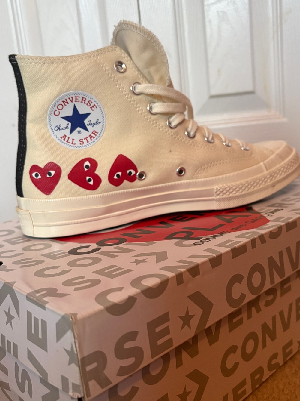 Converse Cream High Top Sneakers with Red Heart Accents